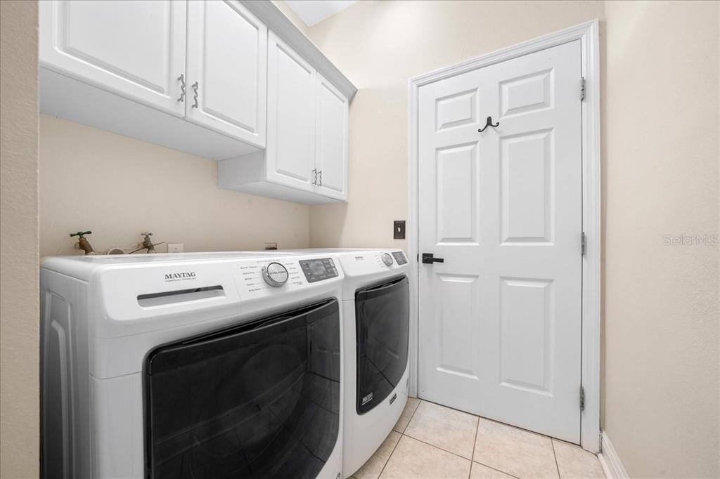 2197 Northwest 55th Avenue Road Ocala, FL 34482 - Photo 50 of 66 a utility room with dryer and washer