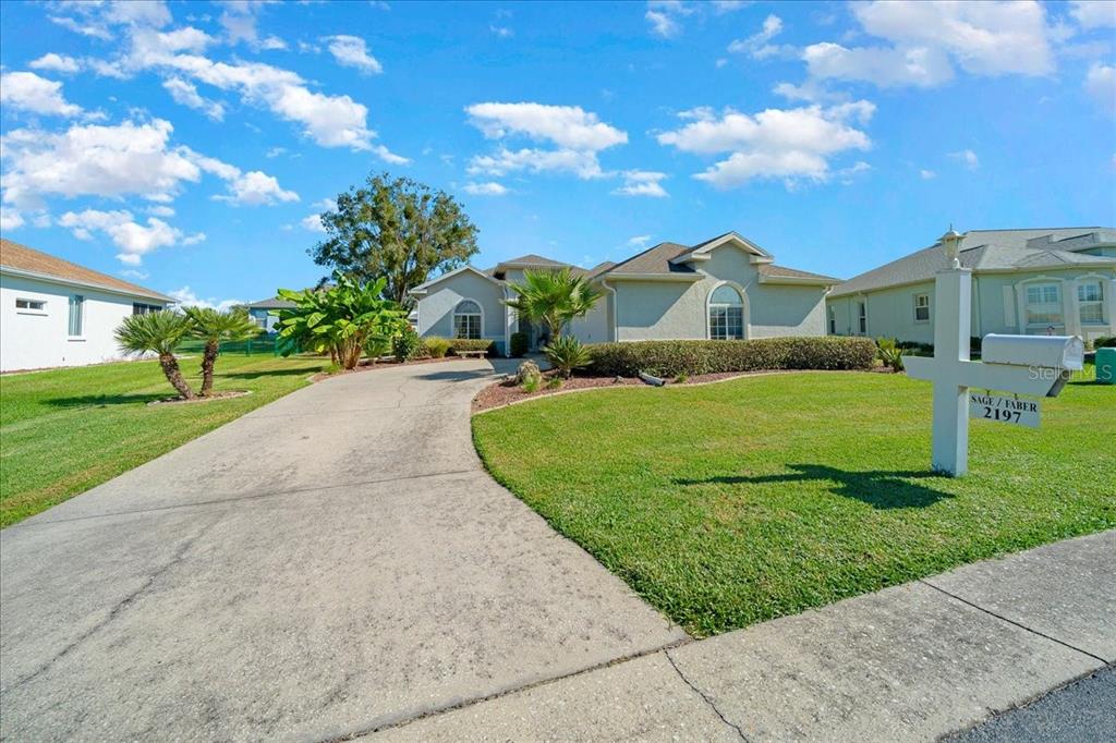 2197 Northwest 55th Avenue Road Ocala, FL 34482 - Photo 53 of 66 a view of a front of house with a yard