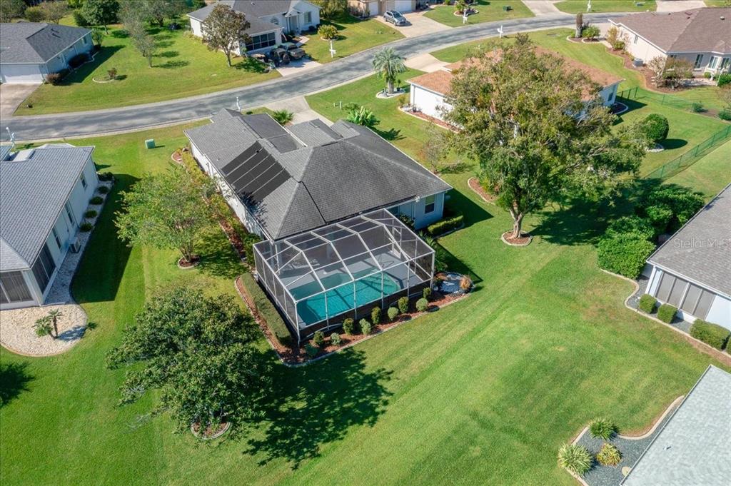 2197 Northwest 55th Avenue Road Ocala, FL 34482 - Photo 58 of 66 an aerial view of a house with yard swimming pool and outdoor seating