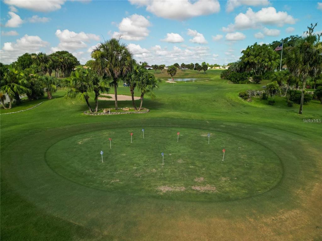 2197 Northwest 55th Avenue Road Ocala, FL 34482 - Photo 66 of 66 a view of a golf course with a lake