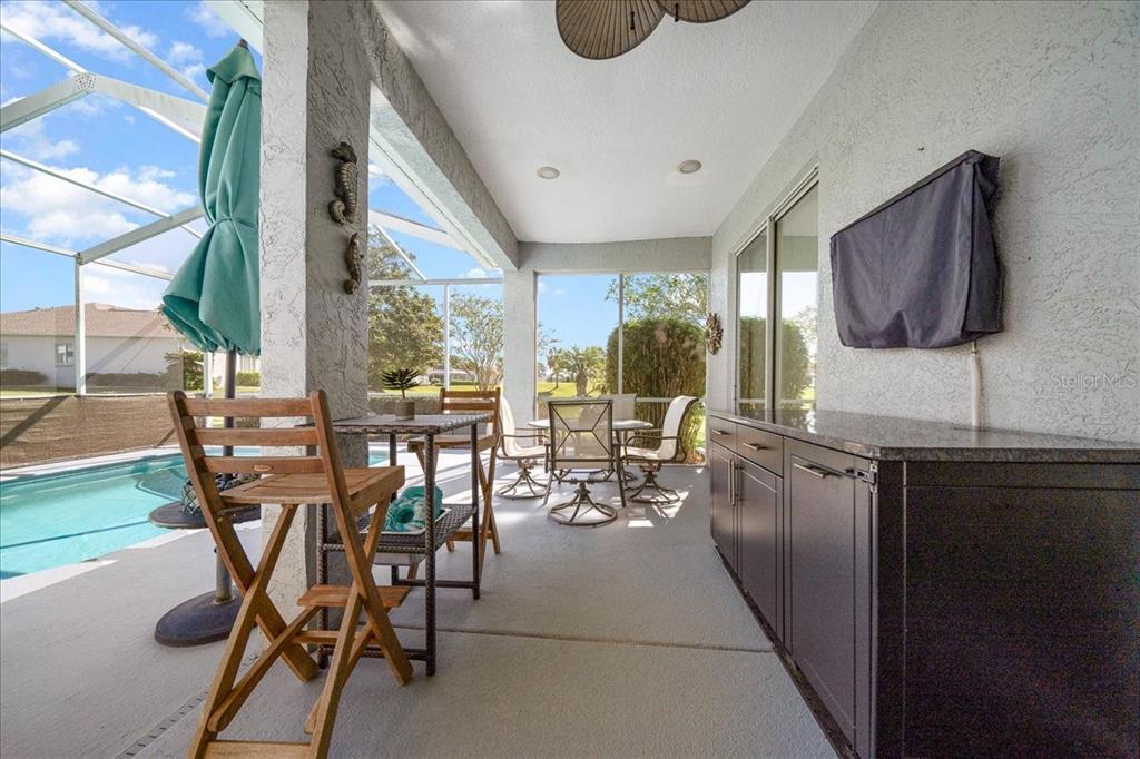 2197 Northwest 55th Avenue Road Ocala, FL 34482 - Photo 9 of 66 a view of a dining room with furniture window and outside view