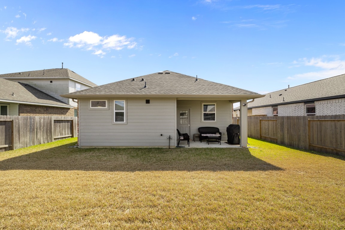 1217 Red Hills Drive Rosharon, TX 77583 - Photo 20 of 25 a view of a house with a patio