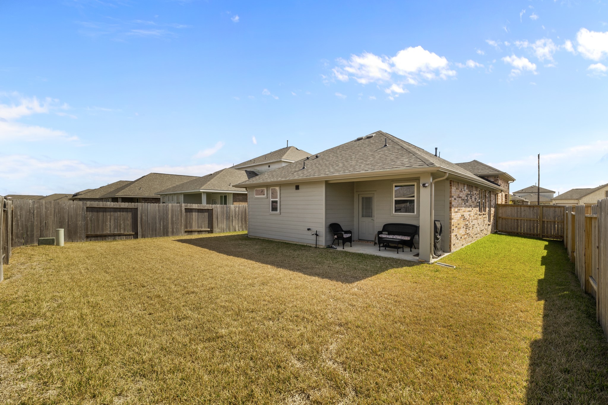 1217 Red Hills Drive Rosharon, TX 77583 - Photo 21 of 25 a view of a house with a patio