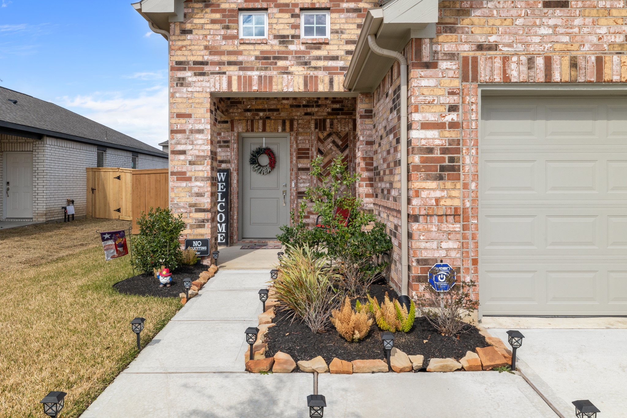 1217 Red Hills Drive Rosharon, TX 77583 - Photo 3 of 25 a front view of a house with a yard