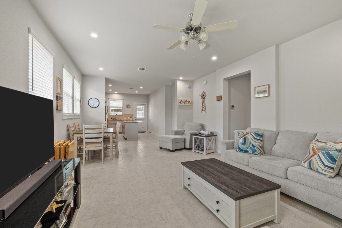 1217 Red Hills Drive Rosharon, TX 77583 - Photo 5 of 25 a living room with furniture and a flat screen tv