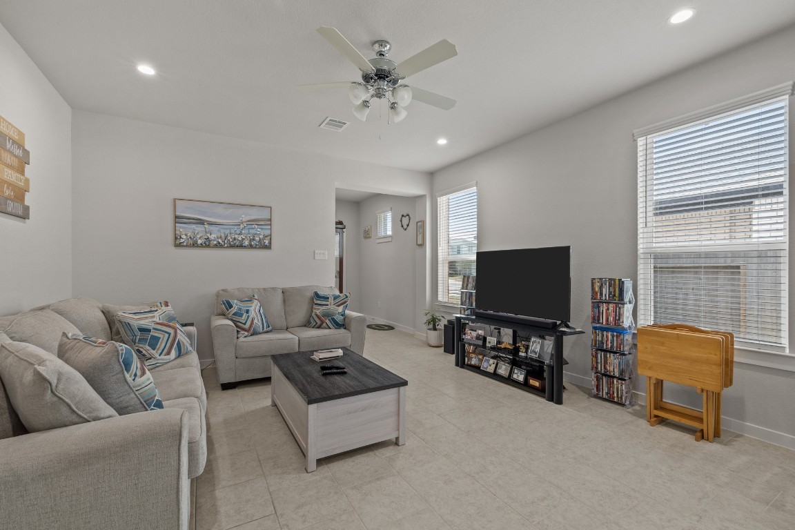 1217 Red Hills Drive Rosharon, TX 77583 - Photo 6 of 25 a living room with furniture and a flat screen tv