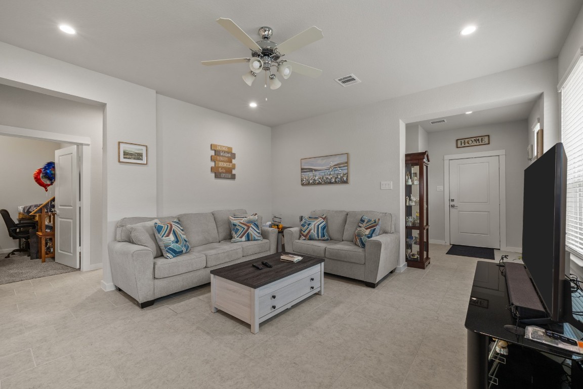1217 Red Hills Drive Rosharon, TX 77583 - Photo 7 of 25 a living room with furniture and a flat screen tv