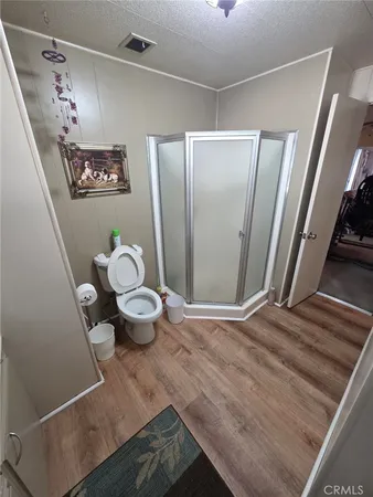 a bathroom with a toilet and a sink