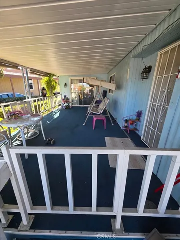 a view of a living room with furniture