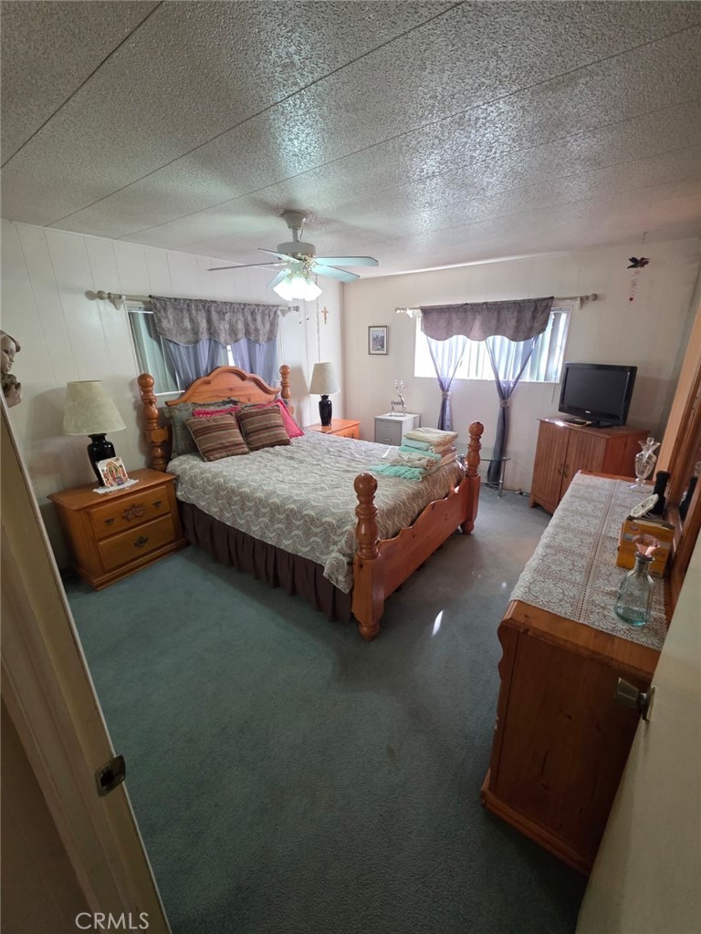 1560 Massachusetts Riverside, CA 92507 - Photo 16 of 26 a bedroom with bed and window