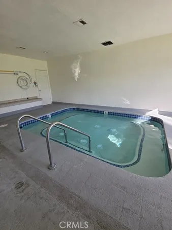 a view of a room with rack on the wall