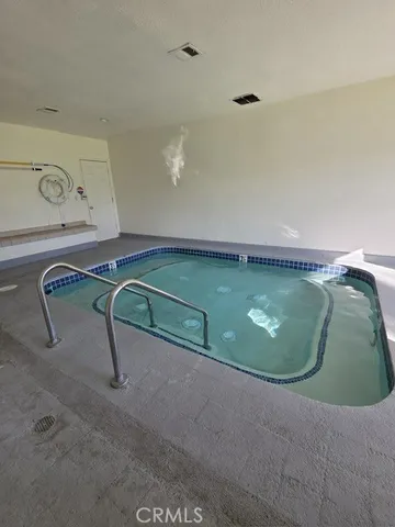 a view of a room with rack on the wall