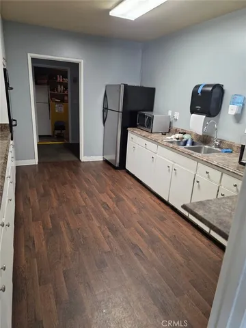 a view of a hallway with seating area