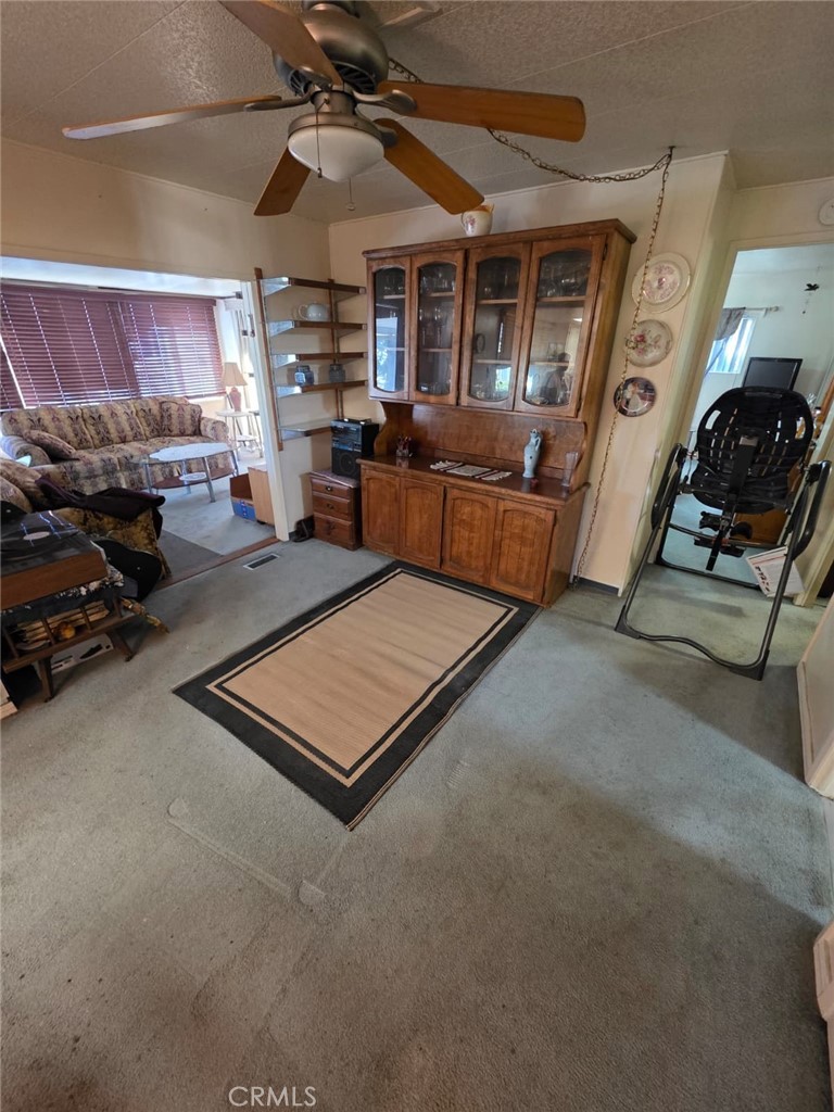 1560 Massachusetts Riverside, CA 92507 - Photo 6 of 26 a room with gym equipment and a window