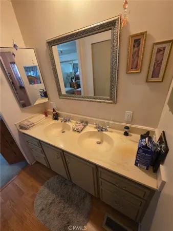 a bathroom with a sink and a mirror