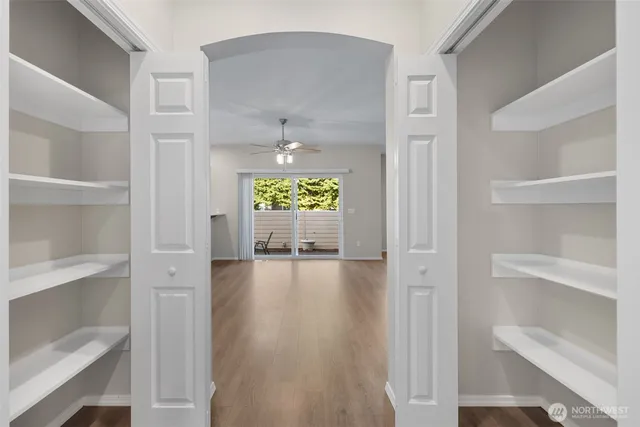 a view of an empty room with a window