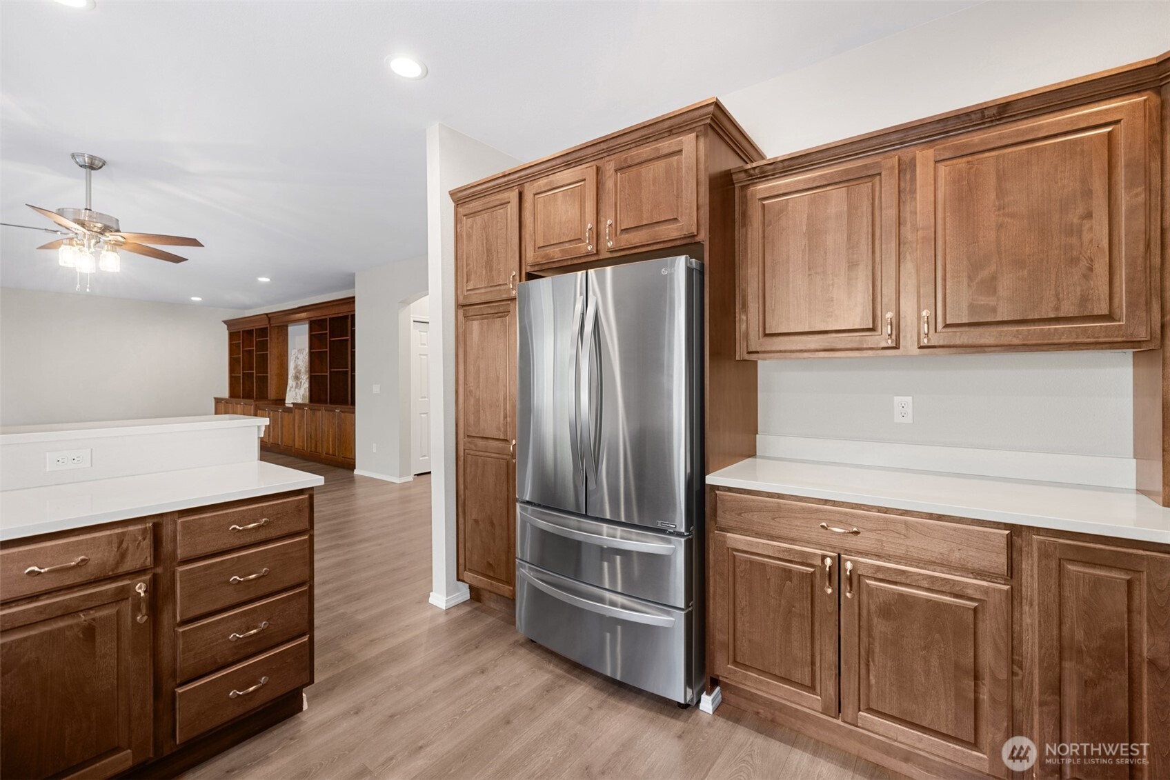 191 Cascadia Loop Sequim, WA 98382 - Photo 30 of 40 a kitchen with cabinets and stainless steel appliances