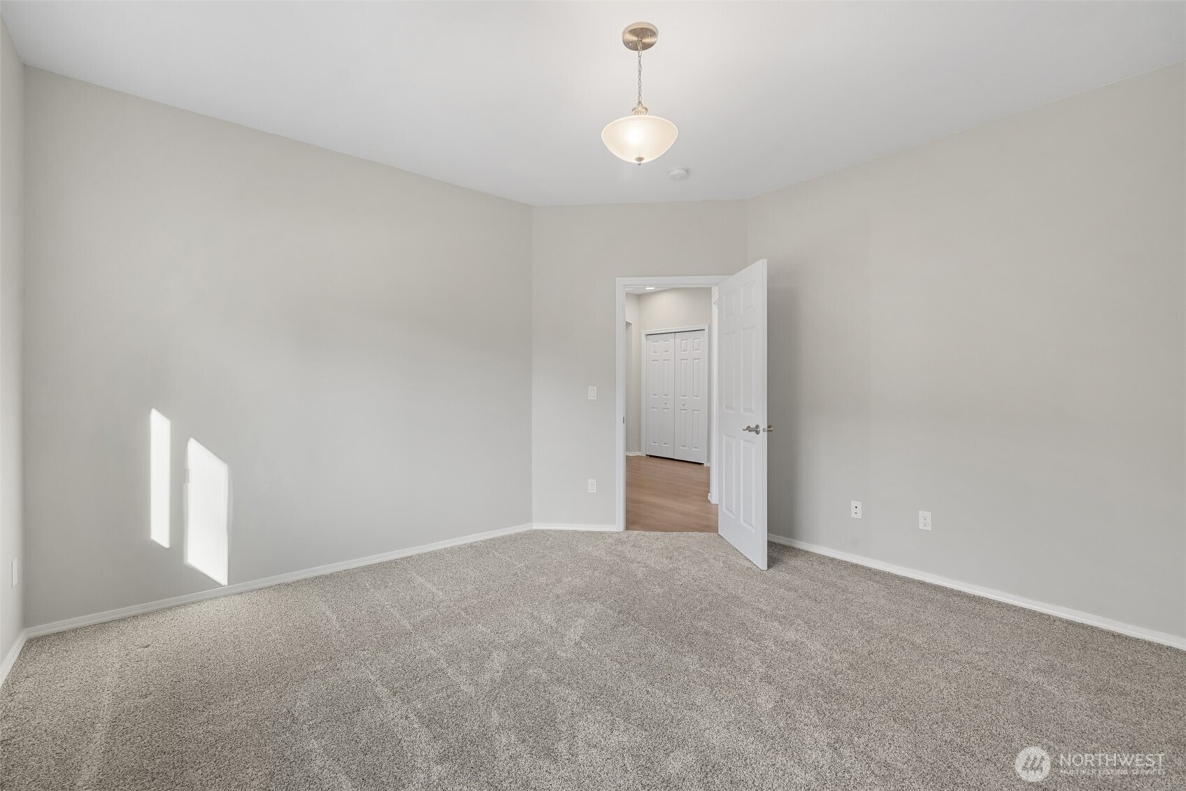 191 Cascadia Loop Sequim, WA 98382 - Photo 33 of 40 a view of an empty room and a chandelier fan