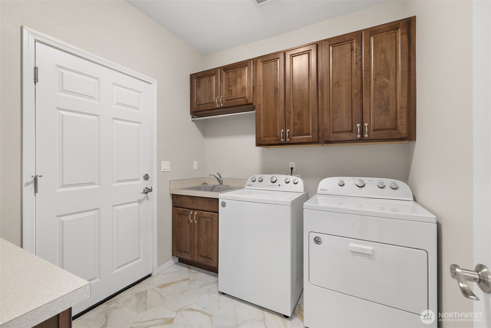 191 Cascadia Loop Sequim, WA 98382 - Photo 39 of 40 a view of storage and utility room with washer and dryer