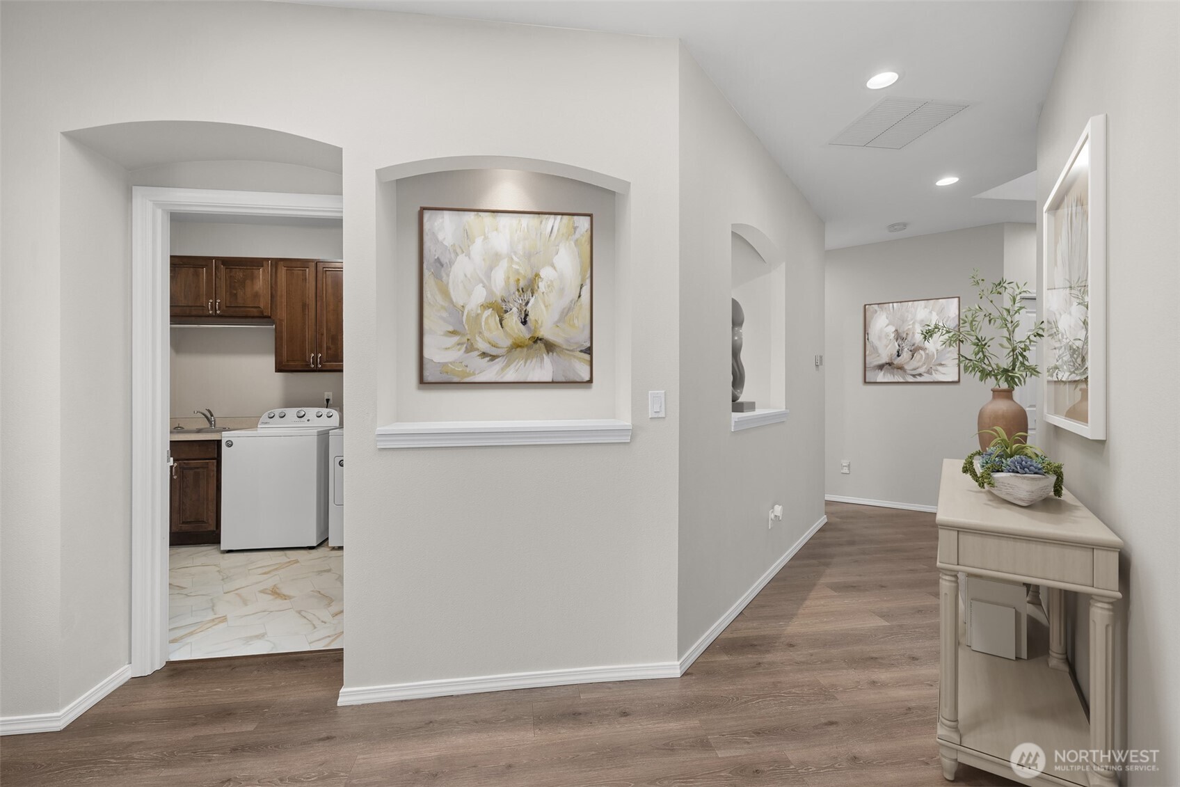 191 Cascadia Loop Sequim, WA 98382 - Photo 5 of 40 a hallway with furniture and wooden floor