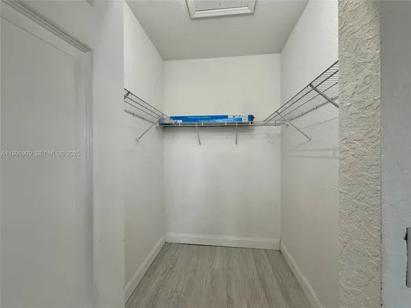 a view of small space with racks on the wall