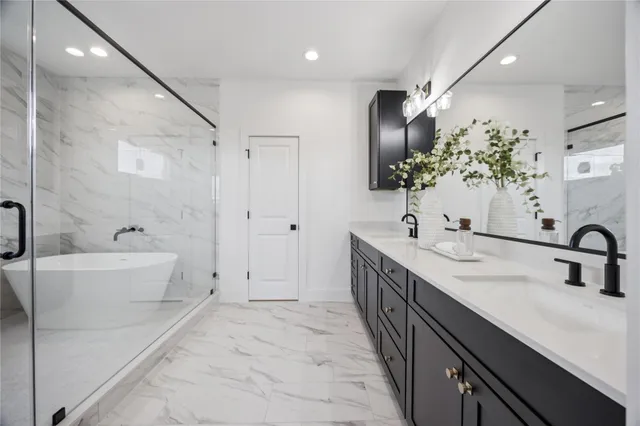 a bathroom with a sink and mirror