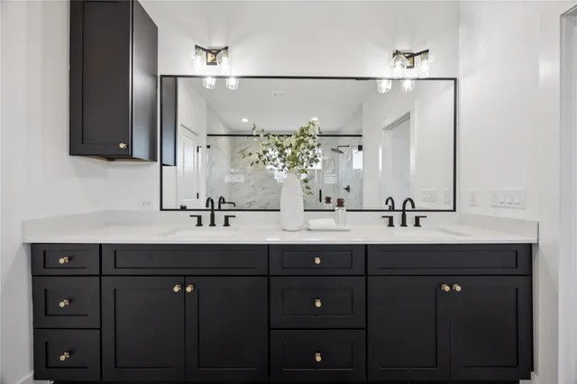 a bathroom with a shower and a bathtub