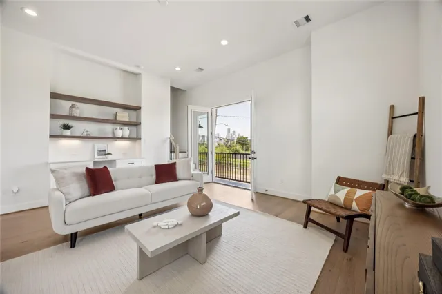 a view of a balcony with furniture