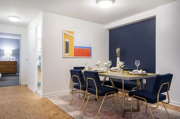 a view of a dining room with furniture