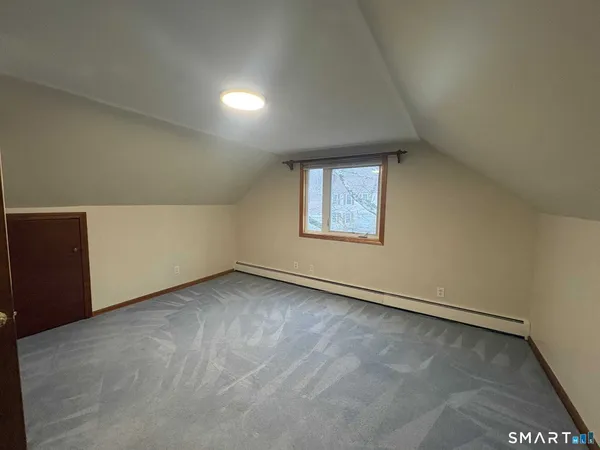 an empty room with a workbench