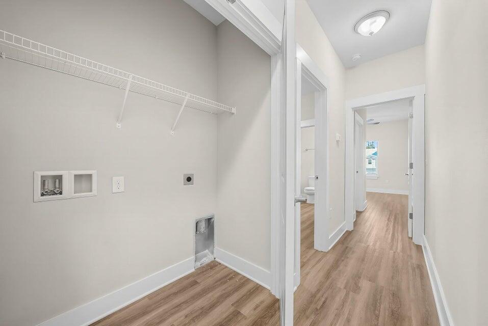 289 North Sand Palm Road, Unit VISTA Freeport, FL 32439 - Photo 28 of 34 a view of a room with wooden floor