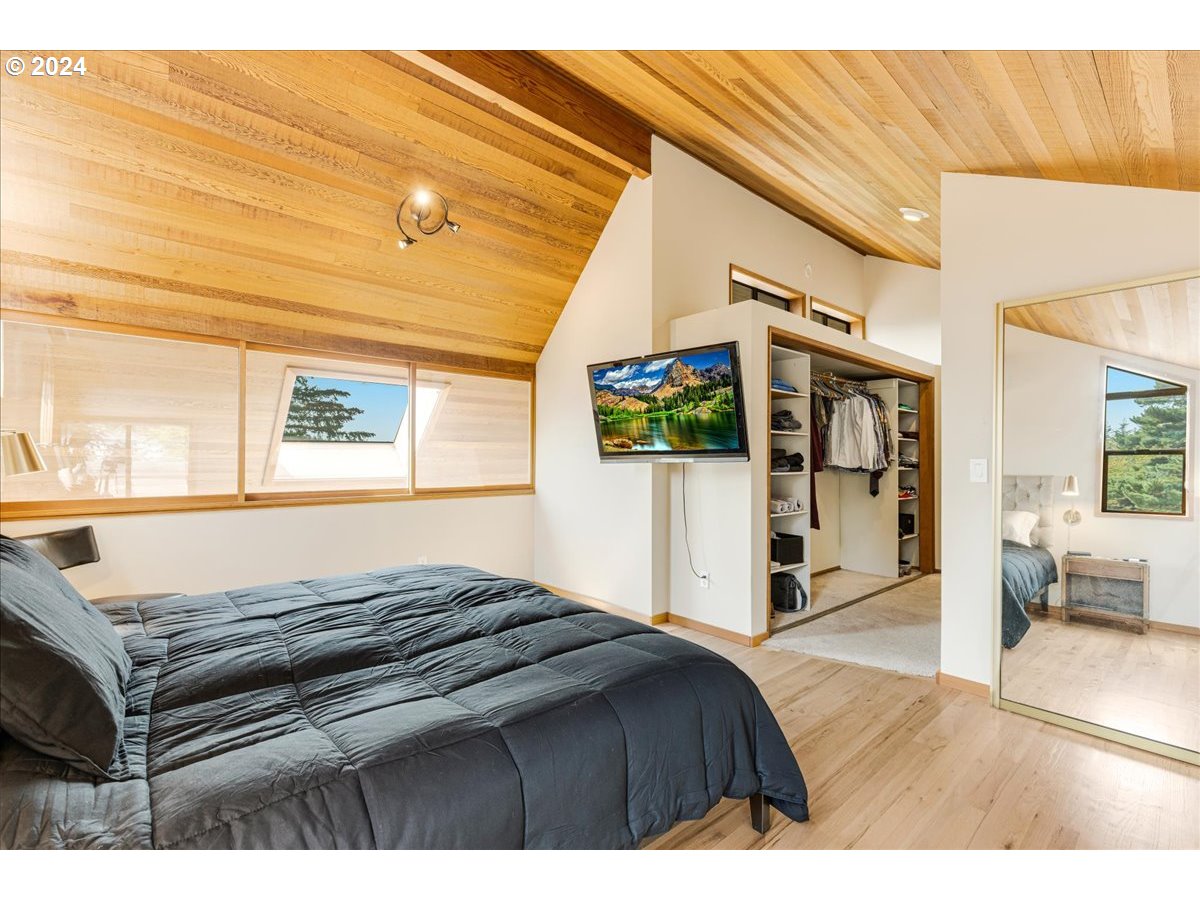 1500 Southwest Walters Drive Gresham, OR 97080 - Photo 15 of 48 a bedroom with a bed and a view of living room