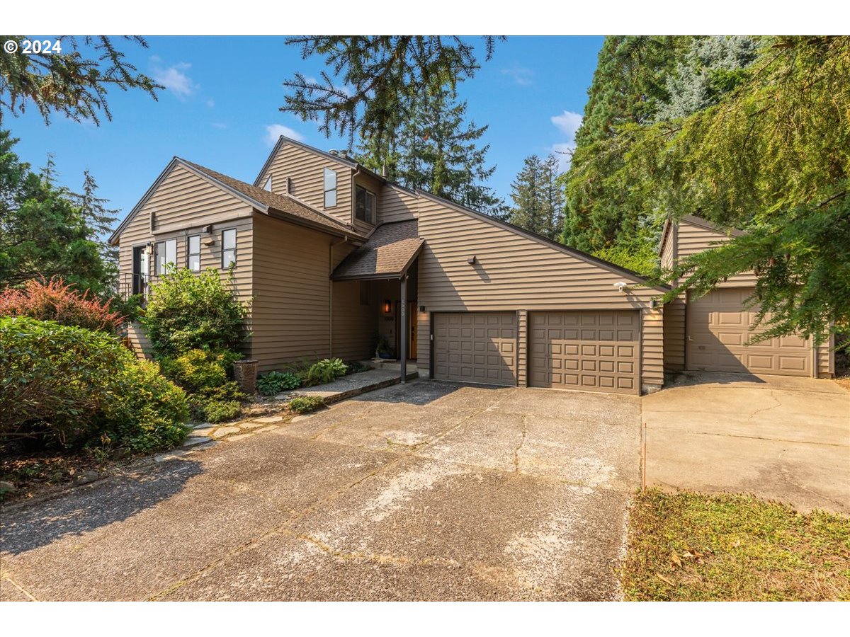 1500 Southwest Walters Drive Gresham, OR 97080 - Photo 2 of 48 a view of a house with a yard