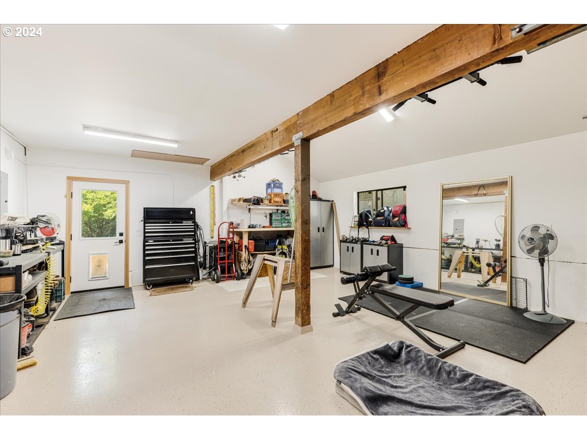 1500 Southwest Walters Drive Gresham, OR 97080 - Photo 30 of 48 a room with gym equipment and a large window