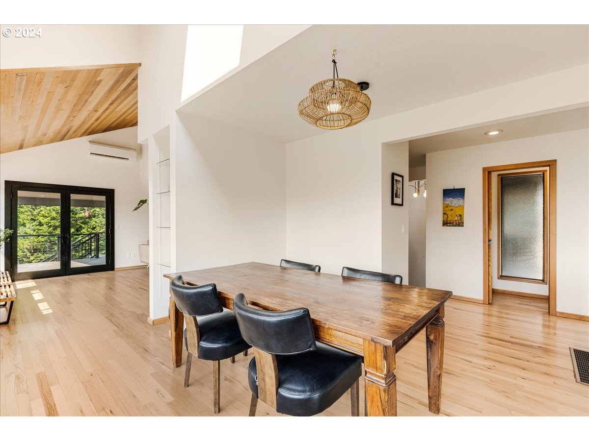 1500 Southwest Walters Drive Gresham, OR 97080 - Photo 8 of 48 a view of a dining room with furniture and wooden floor