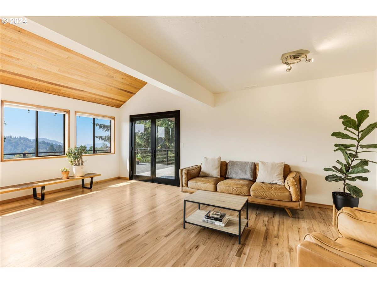 1500 Southwest Walters Drive Gresham, OR 97080 - Photo 9 of 48 a living room with furniture and wooden floor