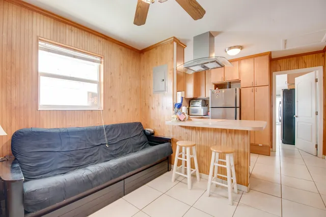 a living room with furniture and a window