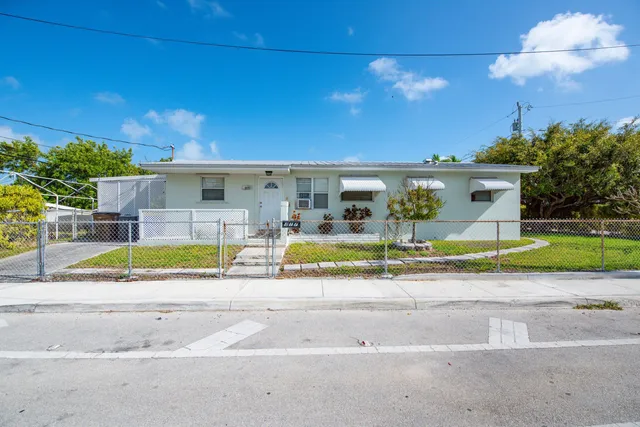 a view of a house with a swimming pool