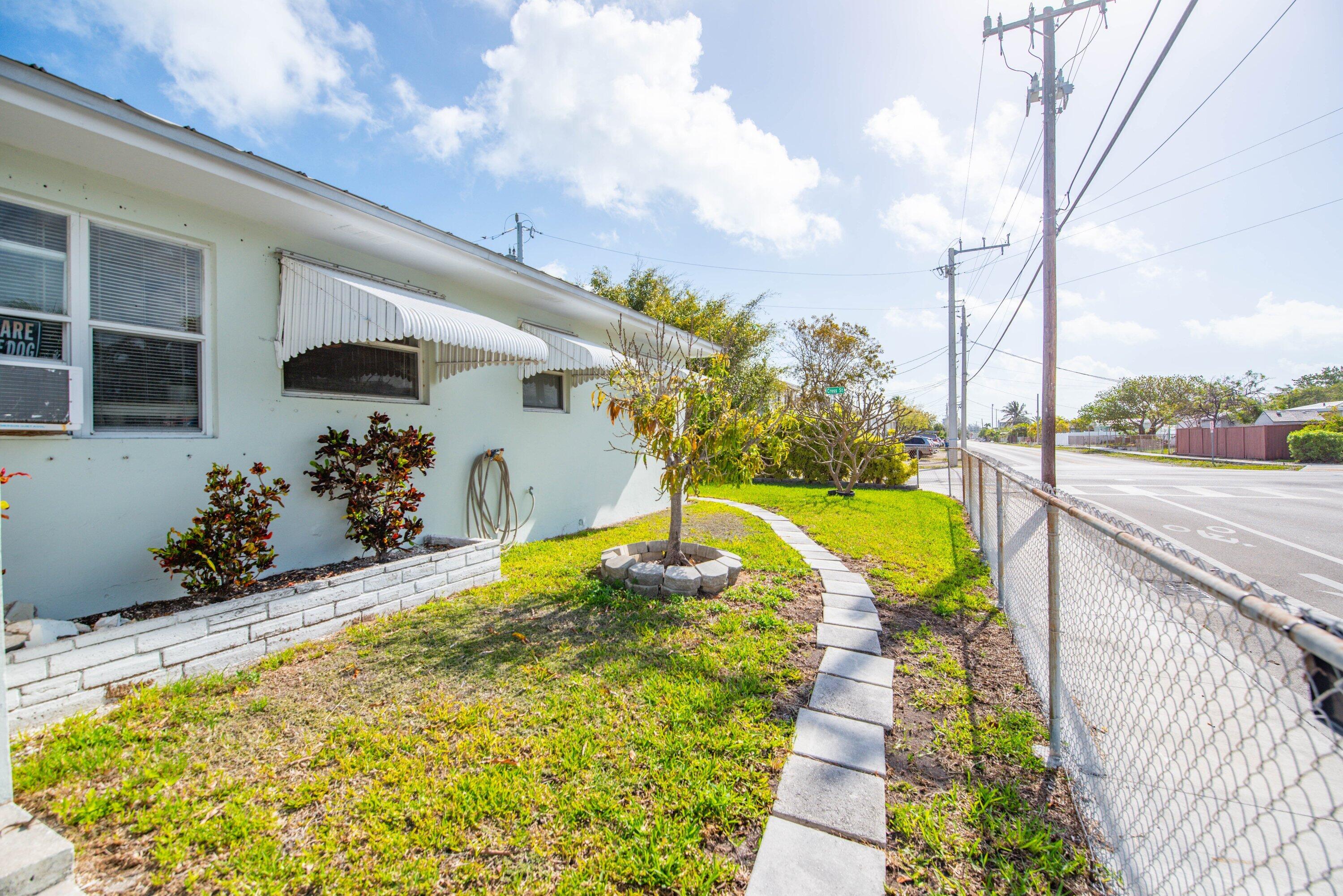 317 Cross Street Stock Island, FL 33040 - Photo 3 of 25 a view of a swimming pool with a patio