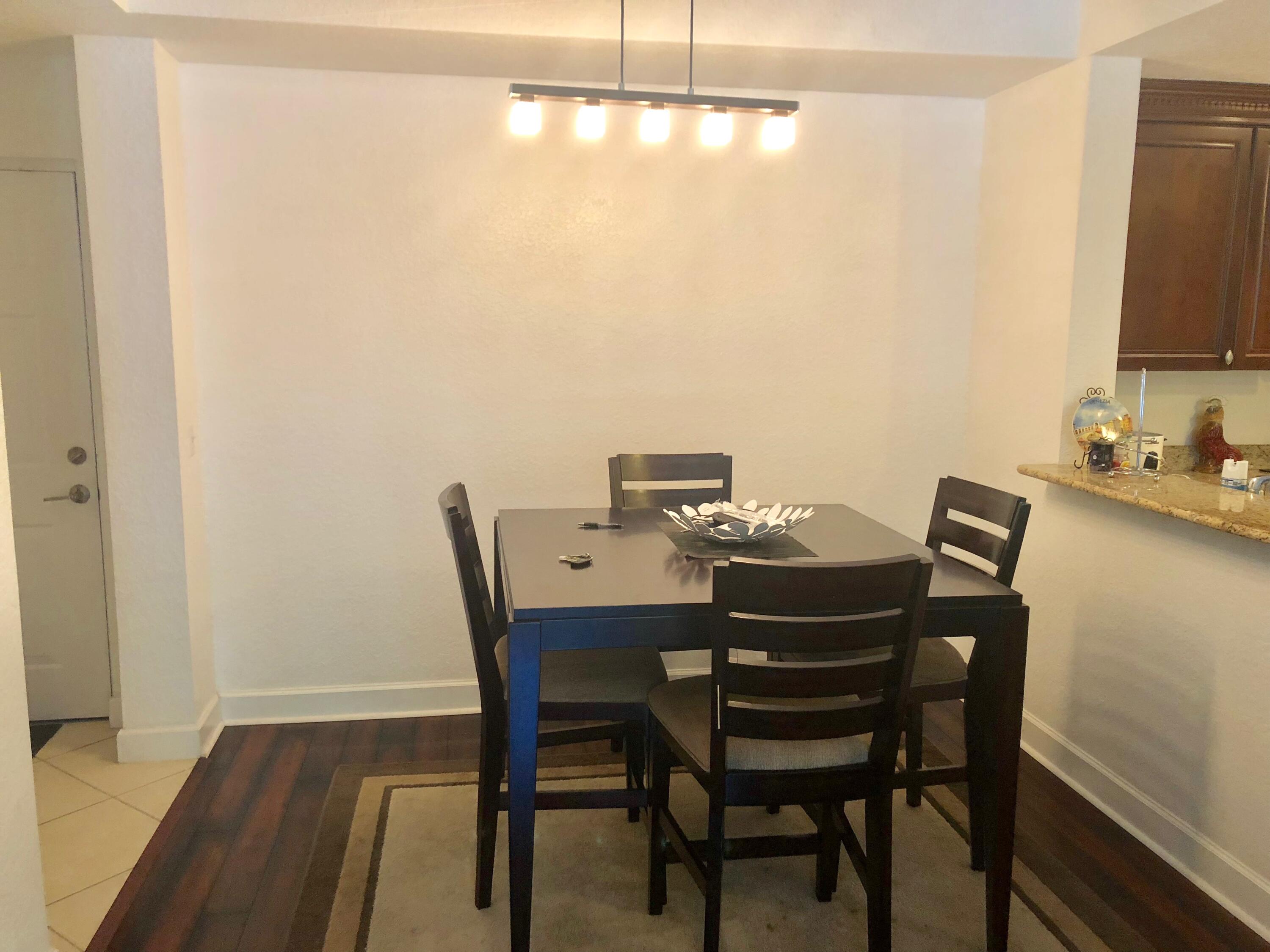 1 Renaissance Way, Unit 214 Boynton Beach, FL 33426 - Photo 3 of 21 Dining Area
