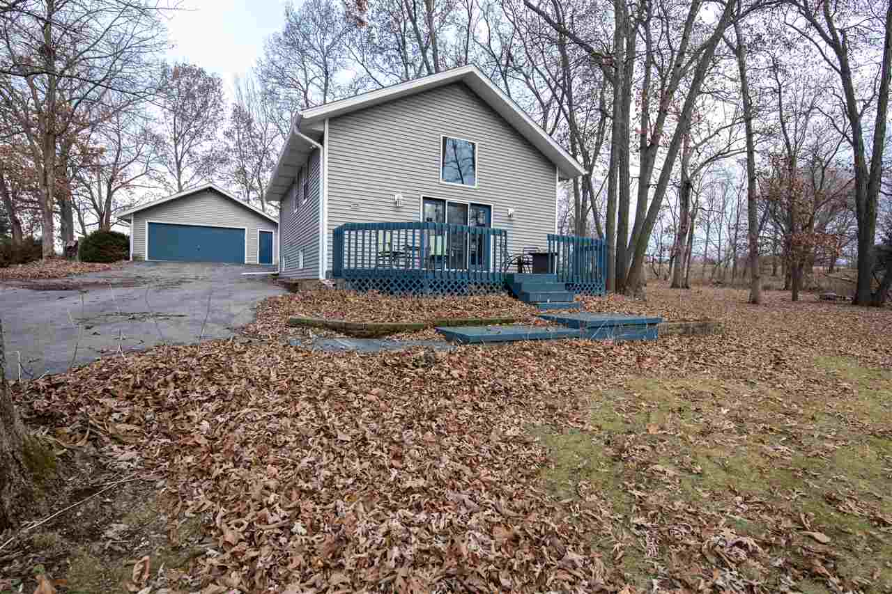 1098 Drexel Road Lake Summerset, IL 61019 - Photo 1 of 25 a view of a house with a yard covered in snow