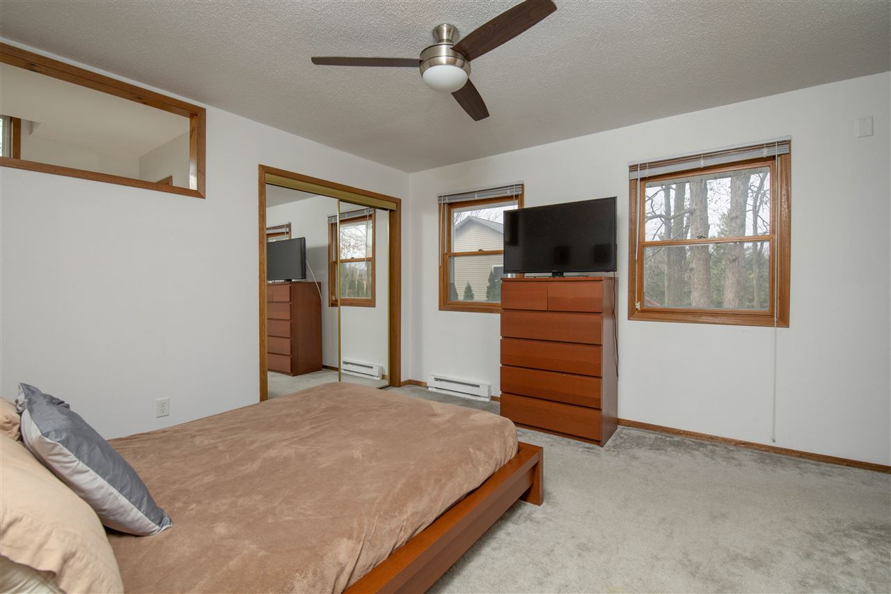 1098 Drexel Road Lake Summerset, IL 61019 - Photo 15 of 25 a bedroom with a bed and a television