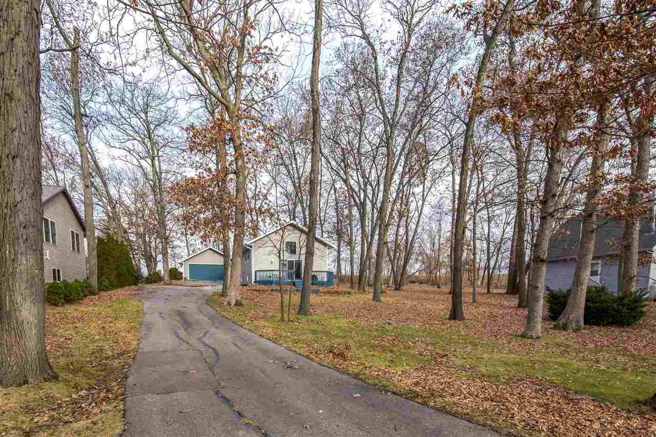 1098 Drexel Road Lake Summerset, IL 61019 - Photo 2 of 25 a view of road with trees