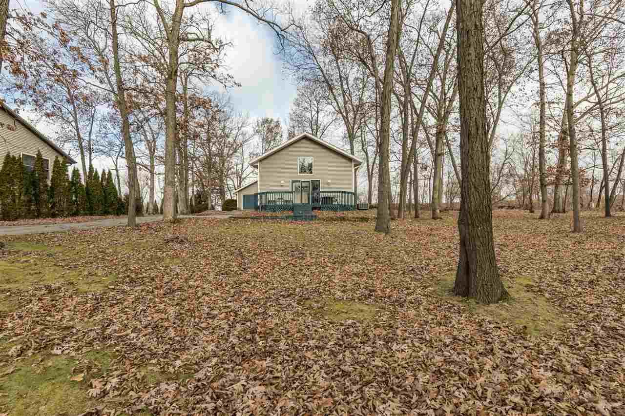 1098 Drexel Road Lake Summerset, IL 61019 - Photo 3 of 25 a house with trees in front of it