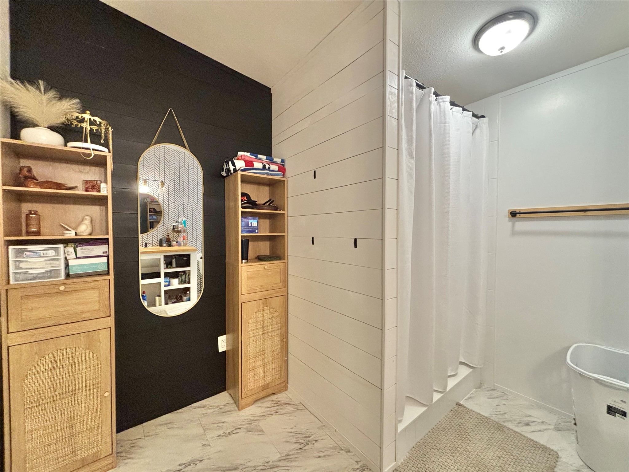 1580 Farm To Market 1745 Colmesneil, TX 75938 - Photo 16 of 36 a bathroom with a shower and mirror