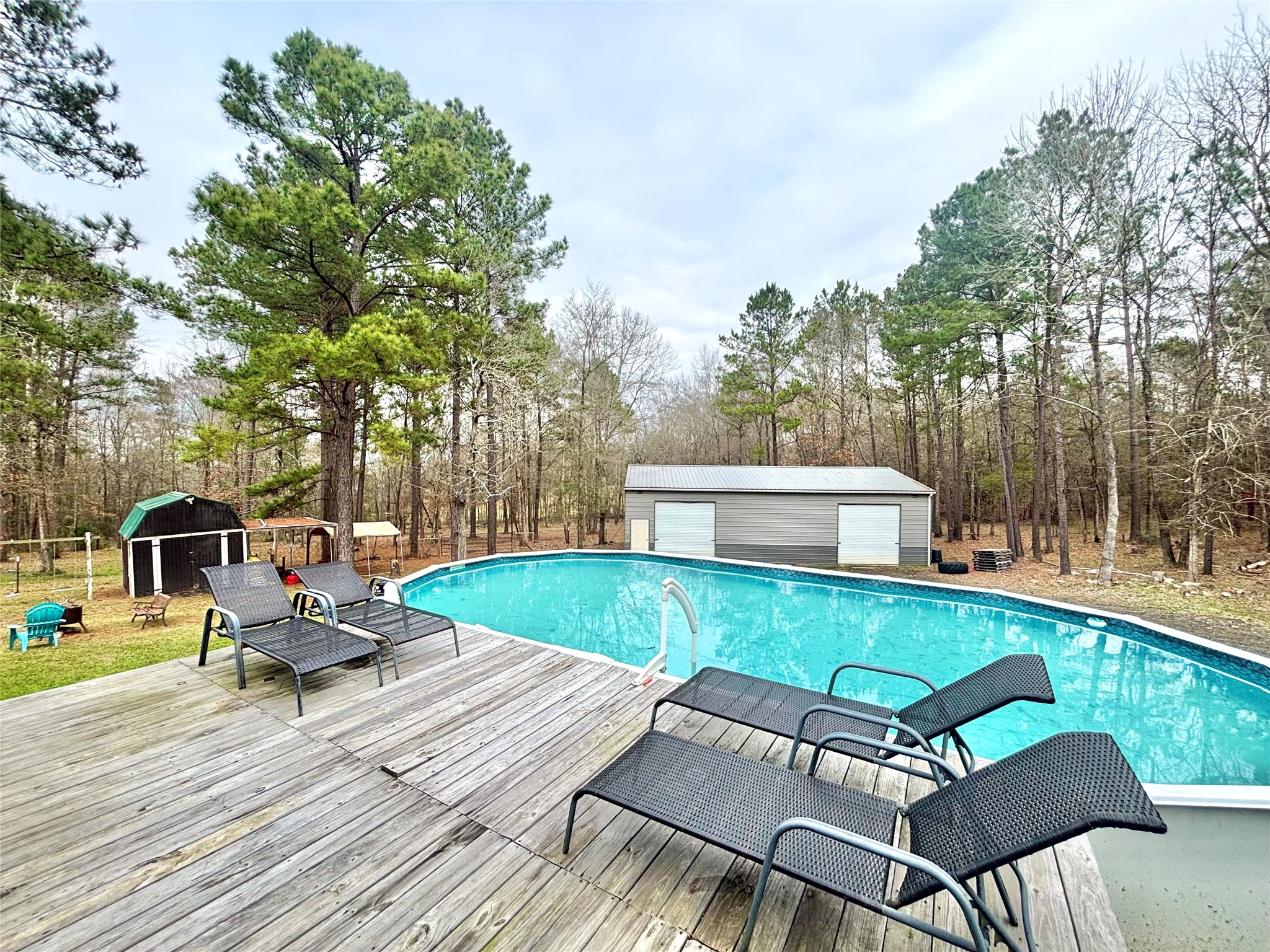 1580 Farm To Market 1745 Colmesneil, TX 75938 - Photo 26 of 36 a backyard of a house with table and chairs