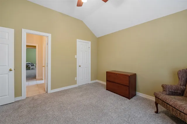 a view of room with furniture and closet