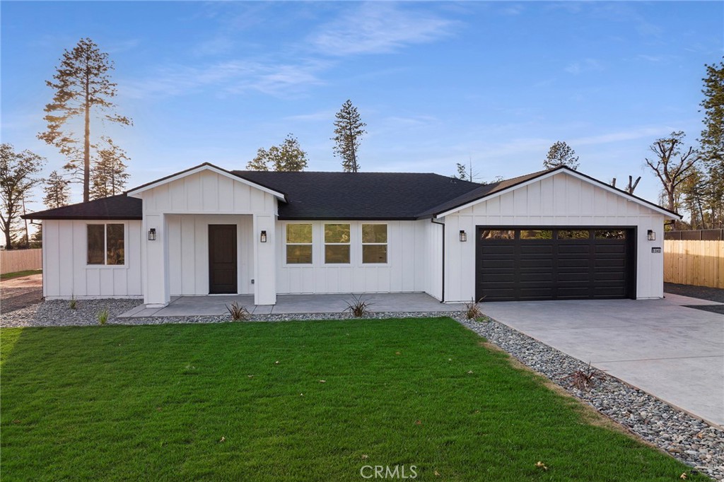 5545 Foland Road Paradise, CA 95969 - Photo 1 of 1 a front view of a house with a garden and yard