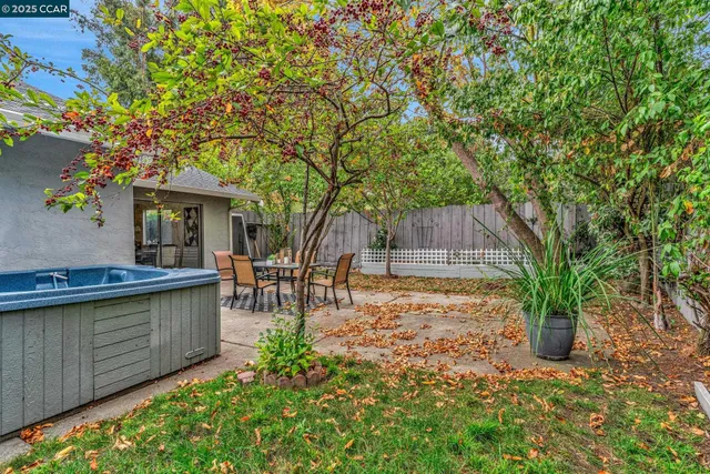a view of house with patio outdoor seating and entertaining space