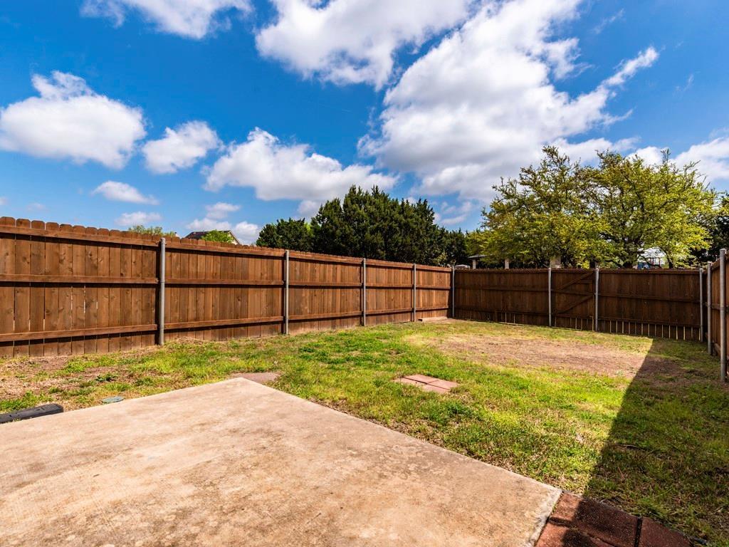 6 Verde Ranch Loop Leander, TX 78641 - Photo 21 of 24 a view of a backyard